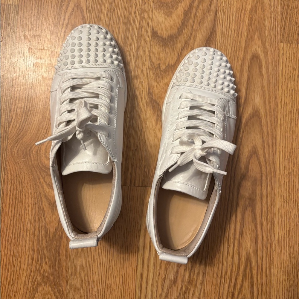 Christian Louboutin 
Red bottoms size 8.5 
Used